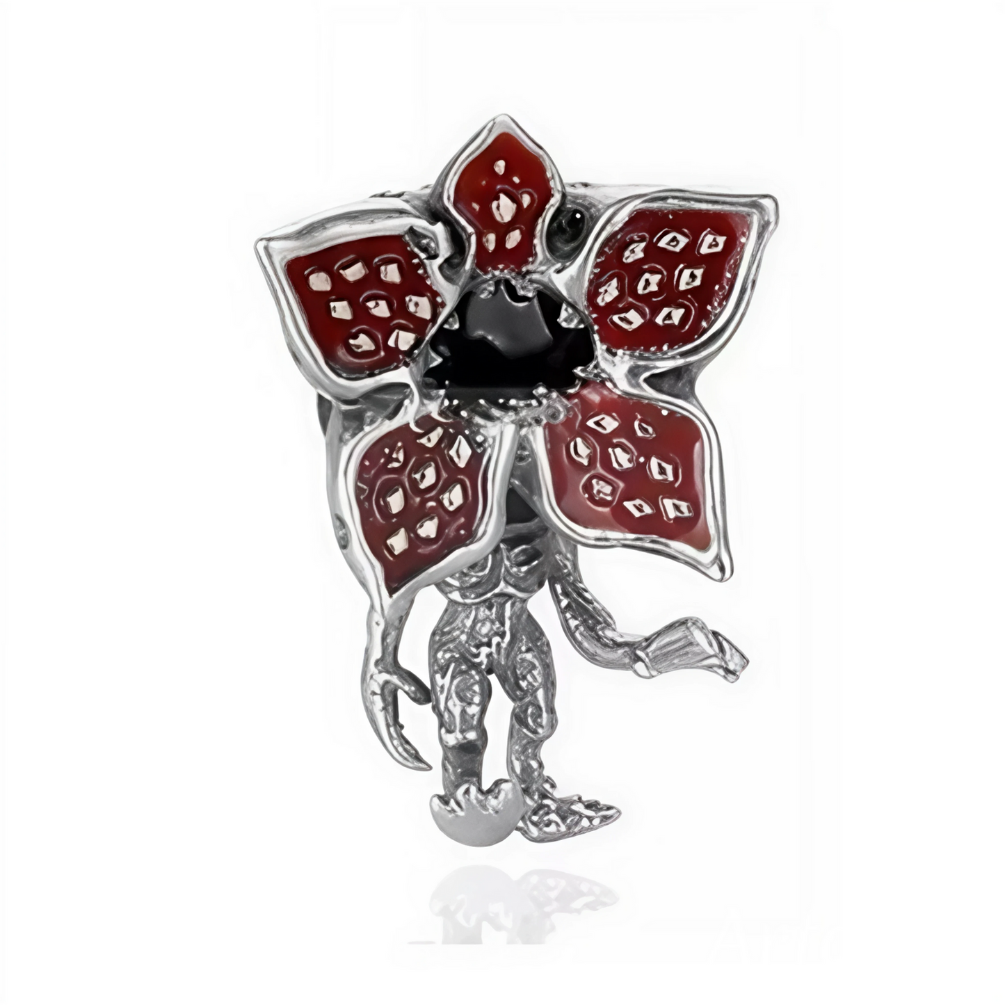 Plongez dans le monde mystérieux et terrifiant de Stranger Things avec le Charm - Démogorgon, en argent sterling S925. Représentant la terrifiante créature du Monde à l’Envers, ce charm est parfait pour les fans de la série culte qui souhaitent ajouter une touche de mystère et d’aventure à leur collection. Le Démogorgon, avec ses pétales menaçantes et son allure inquiétante, devient une pièce audacieuse et unique.