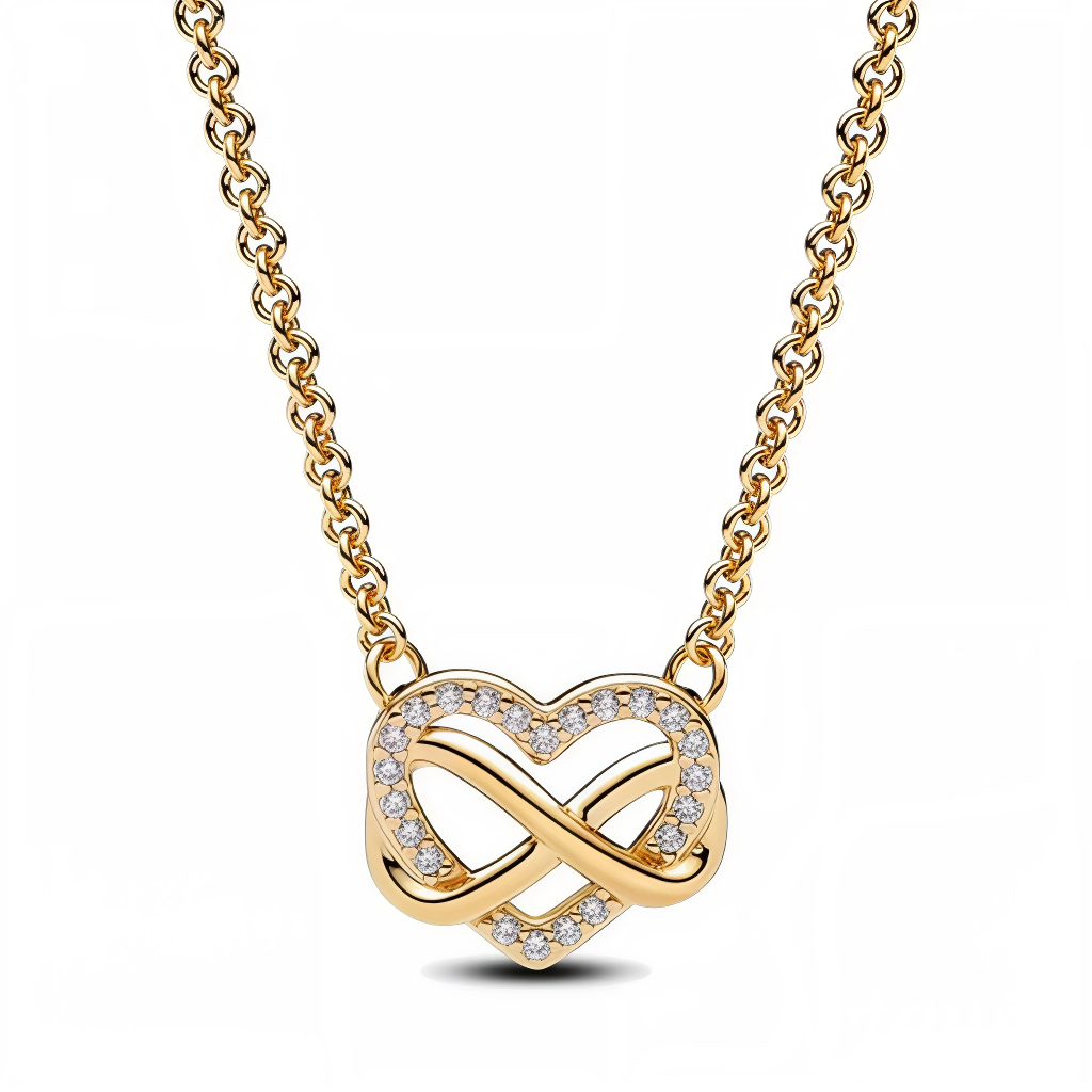 Incarnez l’amour intemporel avec élégance grâce à ce collier raffiné au design symbolique. Son pendentif ajouré associe harmonieusement un cœur et un symbole d’infini, formant une danse poétique qui célèbre les liens éternels. Son éclat doré et ses détails scintillants en font un bijou aussi expressif qu’élégant, parfait pour toutes les occasions.