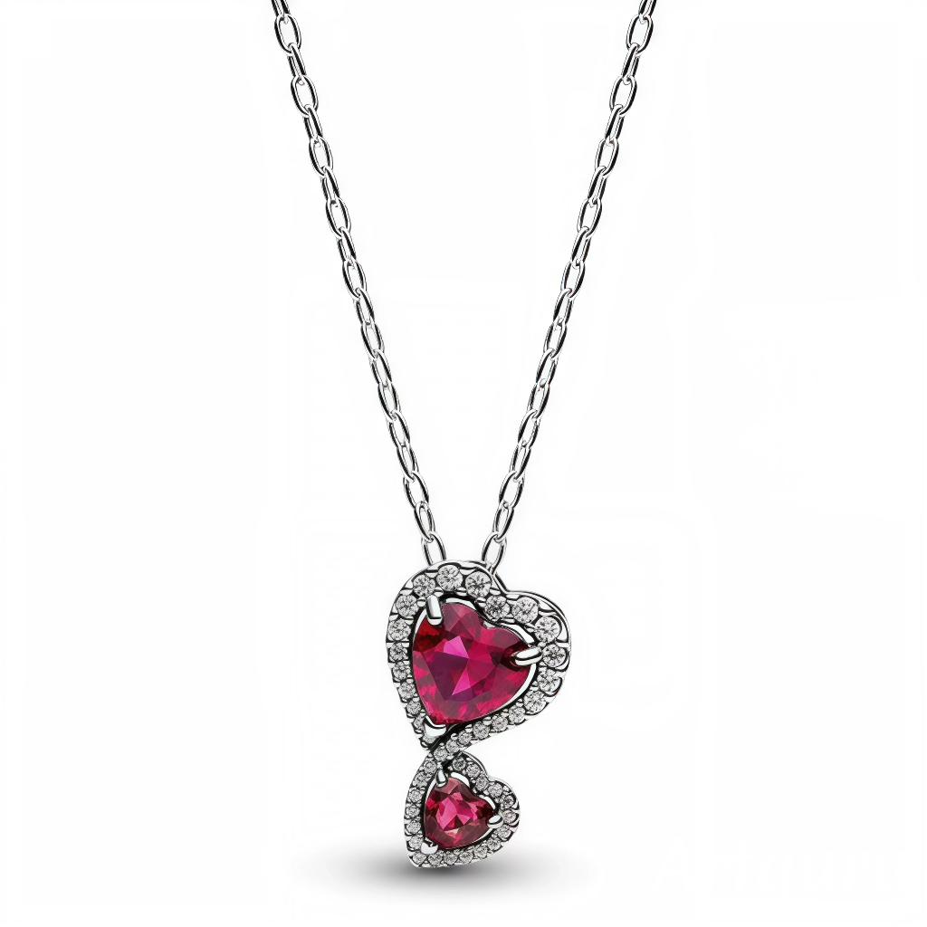 Ce collier délicat met en valeur deux cœurs entrelacés, l'un rouge et l'autre rose, scintillant de strass argentés qui ornent leur contour. Symbolisant l'amour et l'harmonie, il ajoute une touche de romance et de brillance à toutes vos tenues. Un bijou à la fois élégant et intemporel, parfait pour sublimer n'importe quelle occasion spéciale ou apporter de la lumière à votre quotidien.