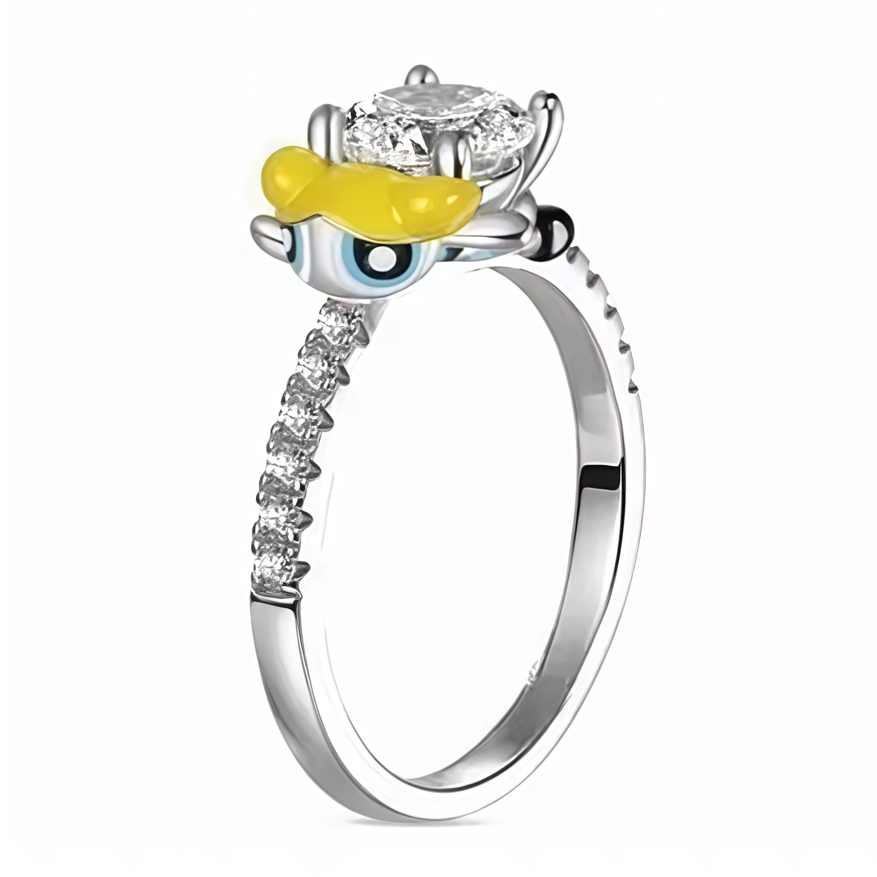 Apporte une touche fun et colorée à ton style avec cette bague inspirée de Bulle, l’héroïne la plus douce des Super Nanas. Son design original, avec le visage du personnage et sa célèbre chevelure blonde, évoque l’énergie, la bonne humeur et l’univers pop de ce dessin animé culte. Un bijou ludique et plein de caractère, parfait pour les fans de Bulle et des années 2000.

Caractéristiques :

-&nbsp;Matière : Argent 925.
-&nbsp;Design : Bague Bulle des Super Nanas avec détails colorés et finition brillante.
-