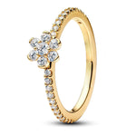 Ajoute une touche de délicatesse et d’éclat à ton style avec cette bague dorée en forme de fleur, sublimée par un strass lumineux en son centre. Son design féminin et raffiné évoque la nature, la douceur et la beauté, tout en apportant une note chic et moderne à ton poignet. Un bijou élégant et facile à porter, parfait pour illuminer le quotidien ou compléter une tenue plus habillée.

Caractéristiques :

- Matière : Argent 925 doré.
- Design : Fleur dorée avec strass central brillant.
- Dimensions : Taille 