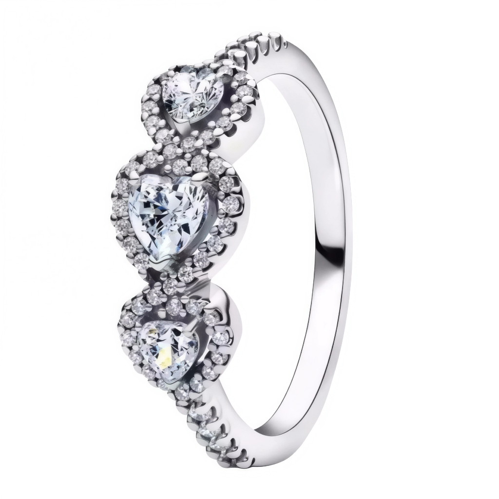 Cette bague en argent 925 met en valeur trois cœurs en oxydes de zirconium transparents, disposés en cascade et entourés d’un halo de micro-strass pour un éclat maximal sur le doigt. L’anneau fin est également partiellement pavé, ce qui crée un rendu lumineux et raffiné, parfait pour les occasions romantiques.

Caractéristiques :

Matière : Argent 925 (S925) et oxydes de zirconium clairs
Design : Trois cœurs de tailles dégradées sertis griffe, entourés d’un halo pavé et anneau partiellement orné de strass
S