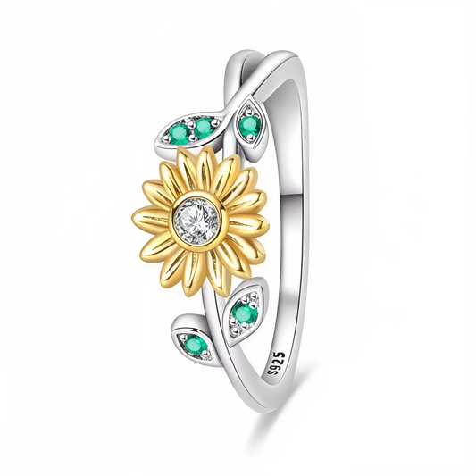 Apportez une touche de lumière et de fraîcheur à votre style avec cette bague en argent 925 représentant un tournesol éclatant. Son cœur jaune vif et ses deux feuilles vertes ornées de strass apportent une note colorée et élégante. Un bijou parfait pour celles qui aiment les inspirations florales et solaires.