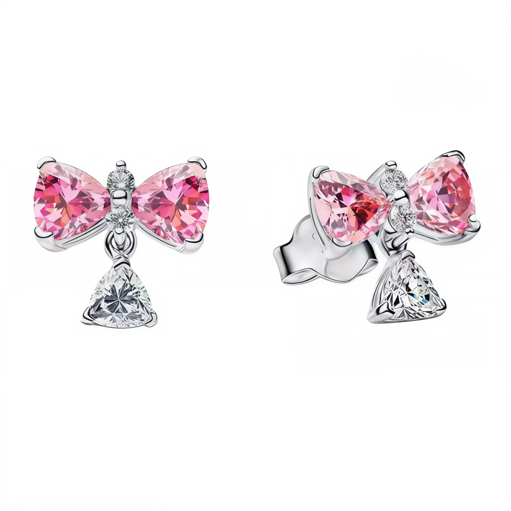 Ajoute une touche de douceur et de féminité à ton style avec ces boucles d’oreilles en argent sterling 925, délicatement façonnées en forme de nœud rose. Symbole d’attachement et d’élégance, leur design raffiné apporte une note tendre et lumineuse à ton visage. À la fois discrètes et charmantes, elles subliment chaque tenue avec une délicatesse irrésistible.

Caractéristiques :

- Matière : Argent 925.
- Design : Nœud rose détaillé, finition brillante et élégante.
- Fermoir : Attache sécurisée et confortabl