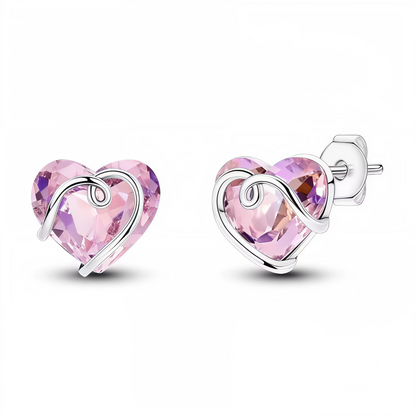 Ajoutez une touche de tendresse et de lumière à votre style avec ces boucles d’oreilles en argent 925 ornées d’un cœur rose scintillant. Leur design délicat et romantique en fait un bijou parfait pour sublimer vos tenues du quotidien comme vos looks élégants.