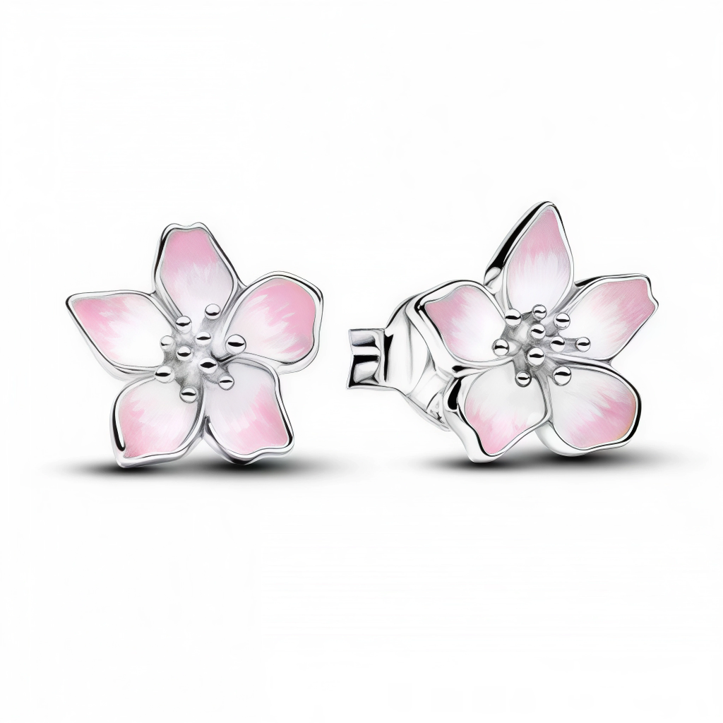 Ces boucles d'oreilles dormeuses arborent une fleur rose émaillée translucide aux pétales dégradés nacrés et cœur texturé, sur un socle argent poli confortable. Idéales pour un style romantique, bohème printanier ou quotidien élégant, elles illuminent le visage d'une douceur naturelle et raffinée. En argent 925 hypoallergénique avec émail résistant, elles assurent confort et éclat durable.