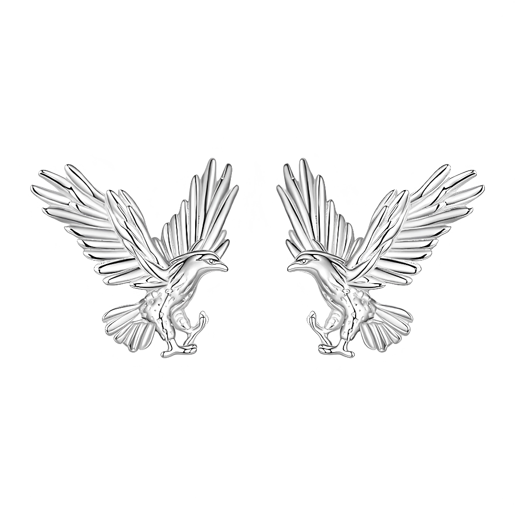 Ces boucles d’oreilles puces incarnent un aigle majestueux aux ailes largement déployées, sculpté en argent 925 avec un relief fin et dynamique qui capture le vol puissant de l’oiseau. La tête fière tournée de profil, le bec crochu et les serres prêtes à fondre mettent en valeur la noblesse et la force de ce rapace iconique. Leur design compact et aérien en fait un bijou symbolique pour les amateurs de nature et de puissance.