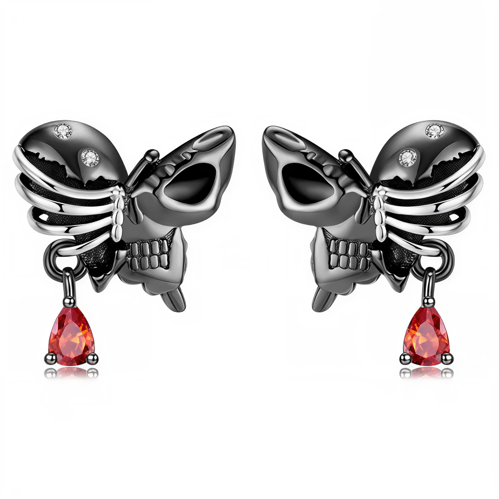 Osez l’audace du style gothique avec ces boucles d’oreilles constituées d’une cage thoracique et d’une tête de mort stylisées, formant un papillon aux ailes de métal noirci. Cet ensemble raffiné est complété par une goutte rouge éclatante suspendue, symbole de vitalité et d’énergie. Idéales pour les amoureux d’univers dark, punk ou Halloween, ces boucles allient sophistication, mystère et un brin de provocation.

Caractéristiques
Matière : Argent 925 plaqué noir, oxyde de zirconium rouge
Design : Papillon f