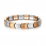 Ce bracelet à charms italien bicolore, composé de 17 maillons en alternance argent et bronze (1 sur 2), est conçu en acier inoxydable de haute qualité, offrant confort, durabilité et élégance. Entièrement réglable, il s’adapte à toutes les tailles de poignet grâce à son système extensible et ajustable. Personnalisable à volonté, vous pouvez y ajouter ou retirer des charms pour créer un bijou unique. L’association raffinée de l’argent lumineux et du bronze chaleureux apporte un style vintage et sophistiqué. 