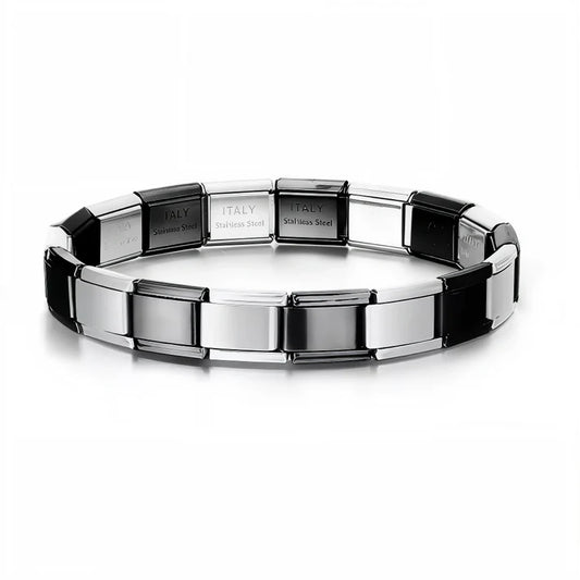 Ce bracelet à charms italien bicolore, composé de 17 maillons en alternance argent et noir (1 sur 2), est fabriqué en acier inoxydable de haute qualité, alliant confort, robustesse et élégance. Entièrement réglable, il s’adapte à toutes les tailles de poignet grâce à son système extensible et ajustable. Personnalisable à souhait, vous pouvez ajouter ou retirer des charms pour créer un bijou unique. Le contraste subtil entre l’argent éclatant et le noir profond apporte une touche de modernité et de caractère