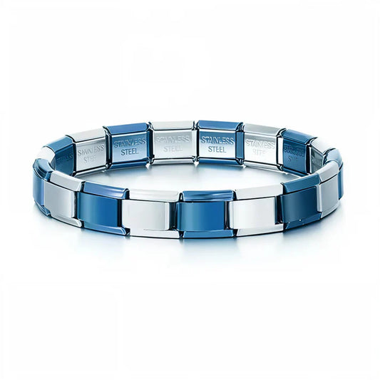 Ce bracelet à charms italien bicolore, composé de 17 maillons en alternance bleu foncé et bleu clair (1 sur 2), est fabriqué en acier inoxydable de haute qualité, alliant confort, solidité et élégance. Entièrement réglable, il s’adapte à toutes les tailles de poignet grâce à son système extensible et ajustable. Modifiable à volonté, vous pouvez ajouter ou retirer des charms pour créer un bijou totalement personnalisé. Son jeu de nuances entre bleu profond et bleu doux lui donne un style original, frais et h