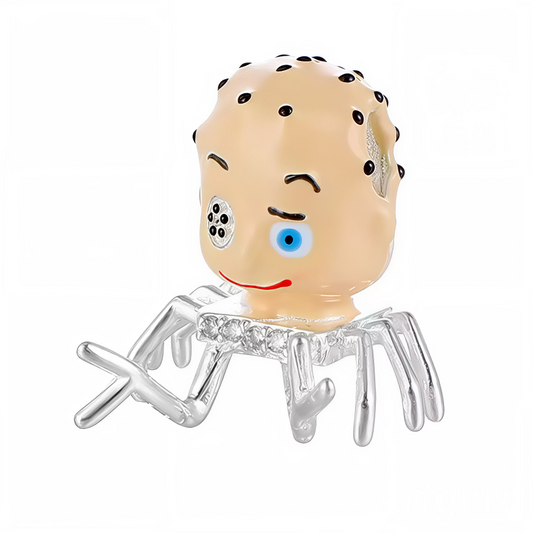 Craquez pour ce charm pendentif en argent 925 représentant Babyface, le visage plein de douceur et de malice. Avec ses traits délicats et son design attendrissant, ce bijou est une véritable déclaration d’amour à l’innocence et à la tendresse. Une pièce idéale pour apporter une note émotive et charmante à votre collection.