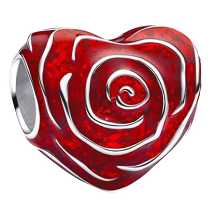 Ajoutez de la couleur et de l'élégance à votre bracelet avec le Charm Cœur Fleurs, délicatement façonné en argent 925. Ce charm représente un cœur orné de fleurs, symbole de l’amour et de la beauté, et disponible en trois teintes : rouge, noir ou rose. Chaque couleur porte son propre message, de la passion intense au mystère délicat, en passant par la douceur romantique.

Que vous choisissiez la couleur qui vous ressemble ou que vous l'offriez à une personne chère, ce charm apportera une touche florale et i