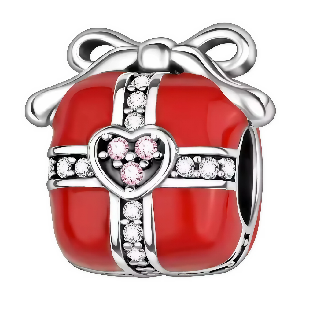 Ajoutez une touche de magie festive à votre bracelet avec ce charm en argent sterling S925 en forme de cadeau de Noël délicatement sculpté, avec un nœud orné de détails minutieux. Ce charm évoque la joie de partager et de recevoir, tout en capturant l’esprit généreux des fêtes. Idéal pour ceux qui adorent la période de Noël, il apportera une touche de festivité et d'élégance à votre collection.