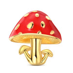 Charm original représentant un champignon rouge à pois dorés, finement travaillé en argent 925. Son design inspiré de la nature, avec son chapeau rouge éclatant et ses détails dorés, apporte une touche ludique, colorée et féerique à votre bracelet ou collier.

Caractéristiques :

- Matière : Argent 925.
- Design : Champignon rouge à pois dorés avec petits champignons sur les côtés.
- Style : Naturel, féerique, coloré et original.
- Symbolique : Nature, chance, magie, croissance et imagination.
- Compatibili