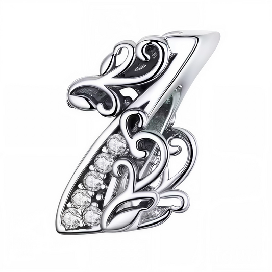 Personnalisez votre bracelet avec ce charm en forme de chiffre "1", fabriqué en argent 925. Un bijou simple et élégant, idéal pour marquer un chiffre important ou symboliser un moment spécial.