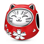 Célébrez la prospérité et la détermination avec ce charm représentant un Daruma rouge, symbole japonais de chance et de persévérance. Fabriqué en argent sterling S925, ce charm est orné de détails raffinés qui capturent l'essence du célèbre porte-bonheur japonais. Le Daruma est un symbole de succès et de bonne fortune, parfait pour accompagner vos objectifs et vos rêves. Compatible avec les bracelets Pandora, il apportera une touche culturelle et porteuse de sens à votre collection.