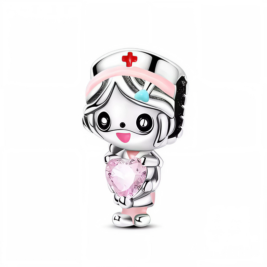 Célébrez la compassion et la force avec ce charm en argent 925 représentant une docteure tenant précieusement une pierre rose en forme de cœur. Ce bijou délicat symbolise le soin, l’amour et l’attention, parfait pour honorer les professionnels de santé ou pour offrir un cadeau chargé de sens.