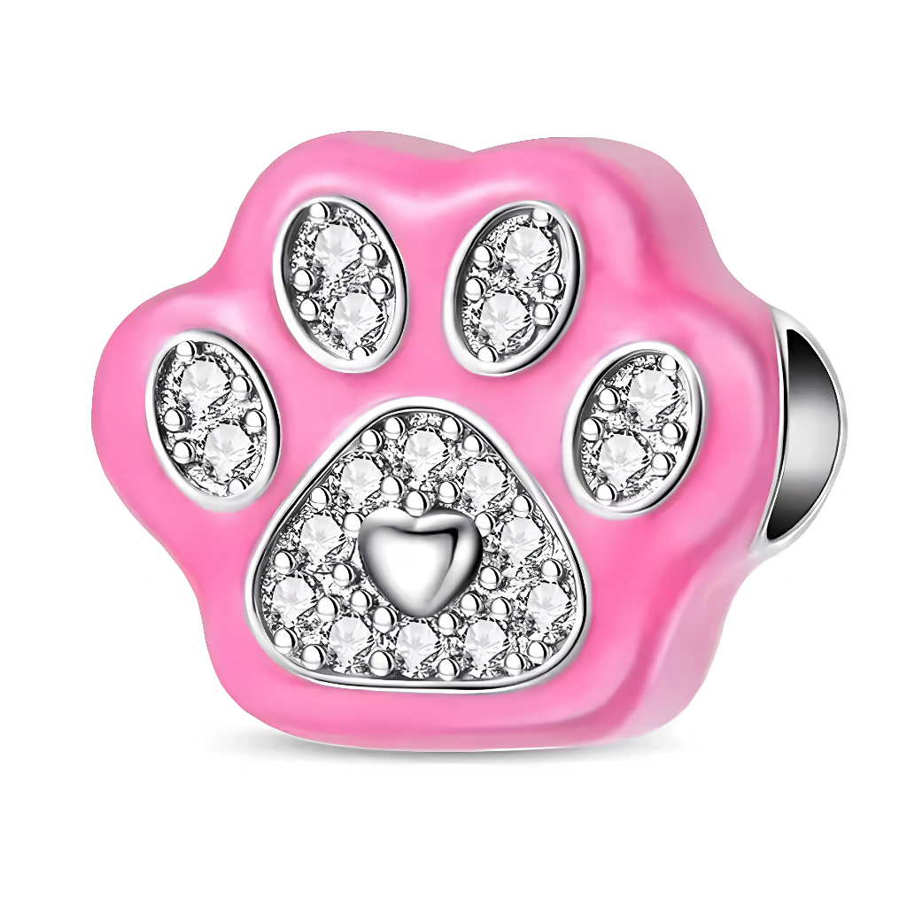 Ce charm pour bracelet en argent 925 reproduit une grande empreinte de patte rose glossy incrustée de strass, avec un petit cœur central pavé de diamants pour célébrer l'amour inconditionnel des animaux de compagnie. La base ronde intégrée s'accroche parfaitement aux bracelets modulaires.

Caractéristiques :

Matière : Argent 925 (S925)
Design : Patte avant 3D émaillée fuchsia, coussinets strassés et cœur central brillant, forme bead ronde percée.
Style : Affectueux et fun, idéal pour amoureux des chiens/ch