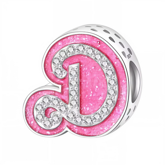 Apportez une touche glamour et fun à votre bracelet avec ce charm en forme de lettre "D", réalisé en argent 925 avec une finition rose brillante et orné de strass blancs scintillants. Un bijou tendance et pétillant, parfait pour afficher un style unique inspiré de l’univers Barbie, ou offrir un cadeau chic et coloré à un être cher.