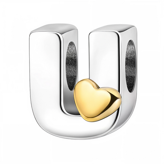 Apportez une touche sentimentale à votre bijou avec ce charm en forme de lettre "U", réalisé en argent 925 et délicatement orné d’un petit cœur doré. Une pièce élégante et pleine de douceur pour personnaliser votre bracelet avec style.
