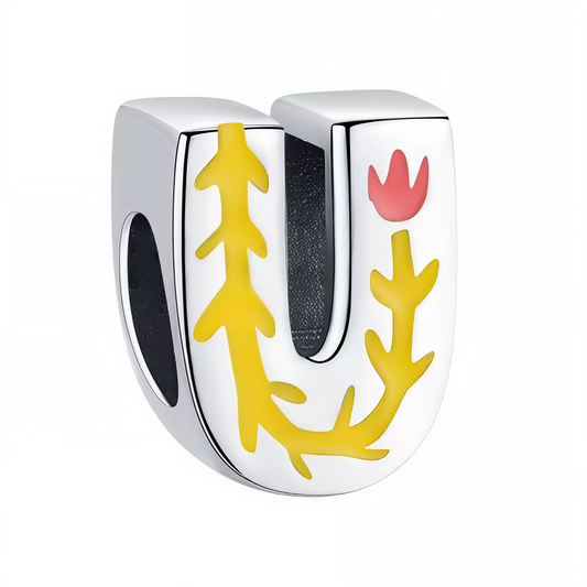 Apportez une touche d’originalité à votre bracelet avec ce charm en forme de lettre "U", réalisé en argent 925 et décoré de taches de couleur dans un style artistique. Un bijou unique et raffiné, parfait pour exprimer votre créativité, votre personnalité ou offrir un cadeau haut en couleur à un être cher.