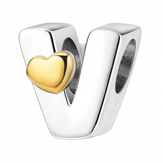 Personnalisez votre bracelet avec élégance grâce à ce charm en forme de lettre "V", fabriqué en argent 925 et décoré d’un petit cœur doré délicat. Un bijou raffiné et sentimental, parfait pour exprimer vos émotions avec douceur.