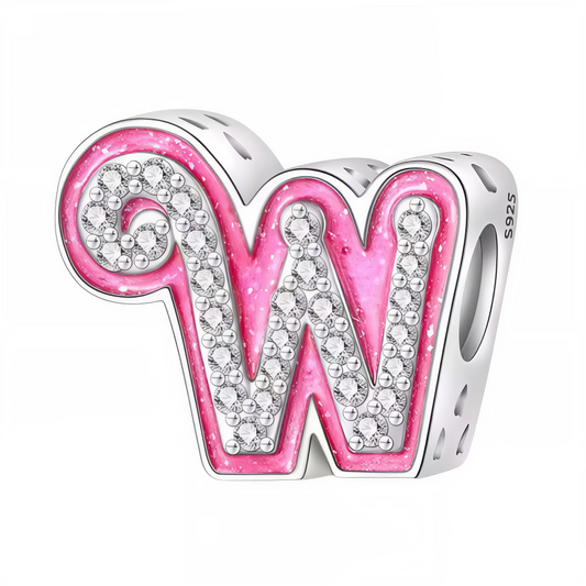 Apportez une touche glamour et fun à votre bracelet avec ce charm en forme de lettre "W", réalisé en argent 925 avec une finition rose brillante et orné de strass blancs scintillants. Un bijou tendance et pétillant, parfait pour afficher un style unique inspiré de l’univers Barbie, ou offrir un cadeau chic et coloré à un être cher.