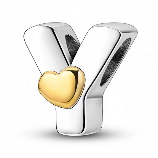 Ajoutez une touche d’élégance et de tendresse à votre bracelet avec ce charm en forme de lettre "Y", façonné en argent 925 et orné d’un petit cœur doré. Un bijou raffiné, idéal pour personnaliser votre collection avec style et émotion.