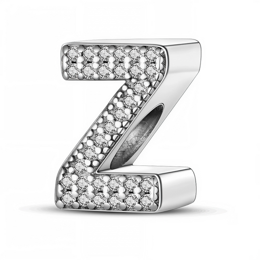Ajoutez une touche finale éclatante à votre bracelet avec ce charm en forme de lettre "Z", réalisé en argent 925 et délicatement orné de strass scintillants. Parfait pour personnaliser votre bijou avec une initiale unique, ce charm allie élégance et brillance.