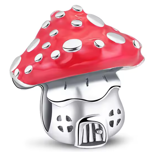 Ajoutez une touche de magie et de féérie à votre collection avec ce charm en forme de maison champignon. Fabriqué en argent sterling 925, ce charm de haute qualité est compatible avec tous les bracelets Pandora, garantissant une intégration parfaite à votre bijou préféré. Parfait pour les amateurs de contes de fées et de paysages enchanteurs, ce charm capture l'esprit fantastique des maisons champignons avec des détails délicats et minutieusement travaillés, ajoutant une note de fantaisie et de charme à vot