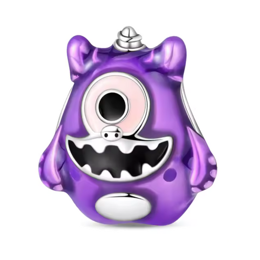 Ajoutez une touche amusante et originale à votre collection avec ce charm monstre violet unique, doté d’un seul œil expressif et d’une corne sur la tête. Ce bijou au design fantaisiste est parfait pour celles et ceux qui aiment afficher un style décalé et plein de personnalité.