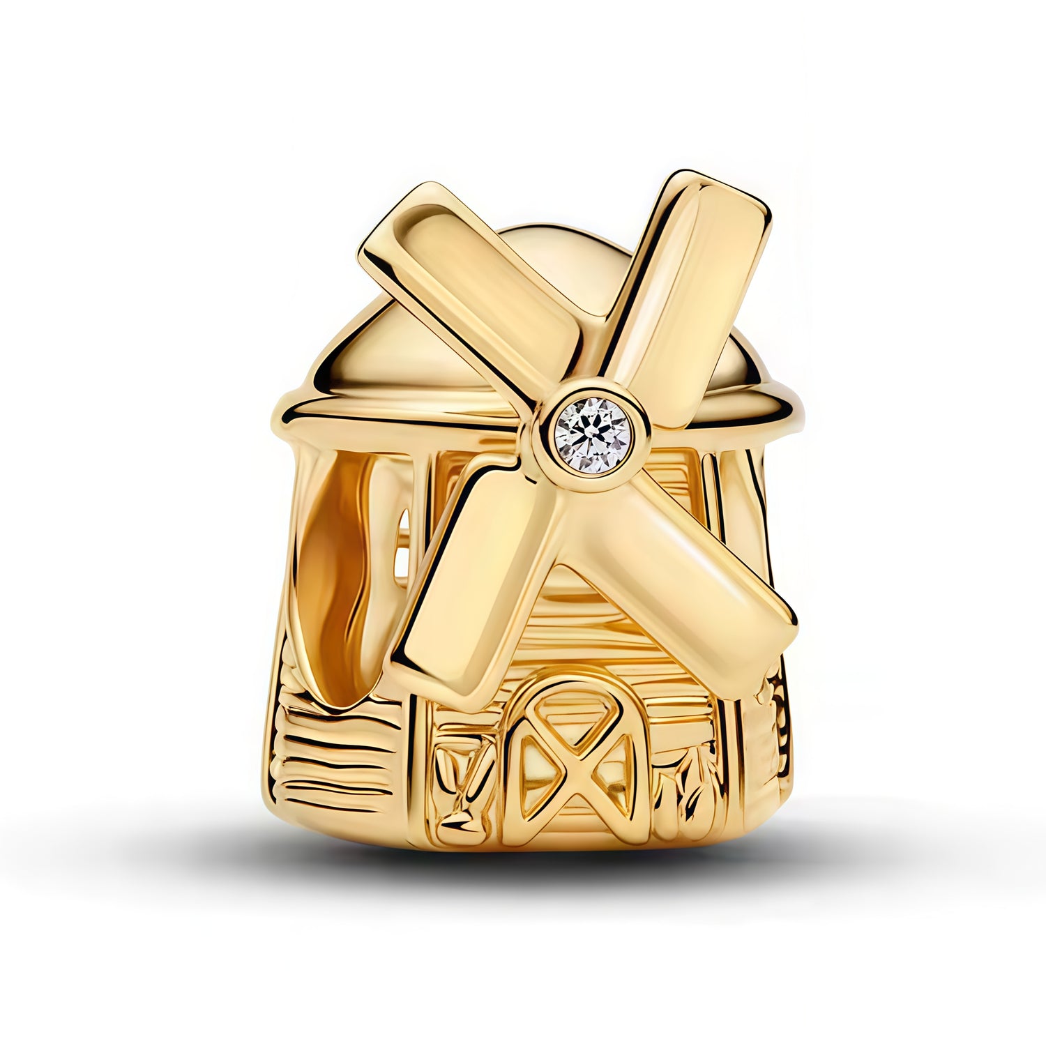 Apporte une touche élégante et voyageuse à ton bracelet avec ce charm moulin doré. Son design inspiré d’un moulin traditionnel, avec sa finition argentée et ses détails dorés, évoque le charme des destinations européennes et l’esprit des collections “Places” de Pandora. Un bijou raffiné et original, parfait pour les amoureux de voyage et de pièces symboliques.

Caractéristiques :
-&nbsp;Matière : Argent 925.
-&nbsp;Design : Charm moulin doré avec finition soignée et détails décoratifs.
-&nbsp;Dimensions : T