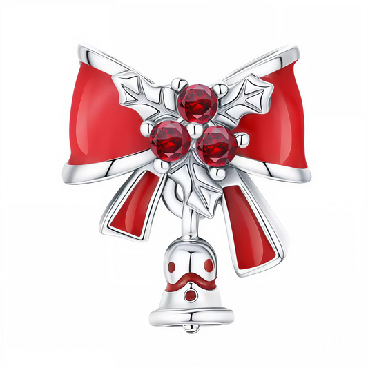 Apportez la magie des fêtes à votre poignet avec ce charm raffiné, véritable hommage à l’esprit de Noël ! Son nœud rouge éclatant, sublimé par des cristaux scintillants et des feuilles de houx, évoque instantanément la chaleur et la convivialité des célébrations hivernales. La petite cloche argentée qui pend ajoute une touche festive et authentique, rappelant les traditions joyeuses de la saison. Fabriqué en argent 925 et ornée d’émaux et pierres de qualité, ce charm illumine toutes vos compositions de bijo