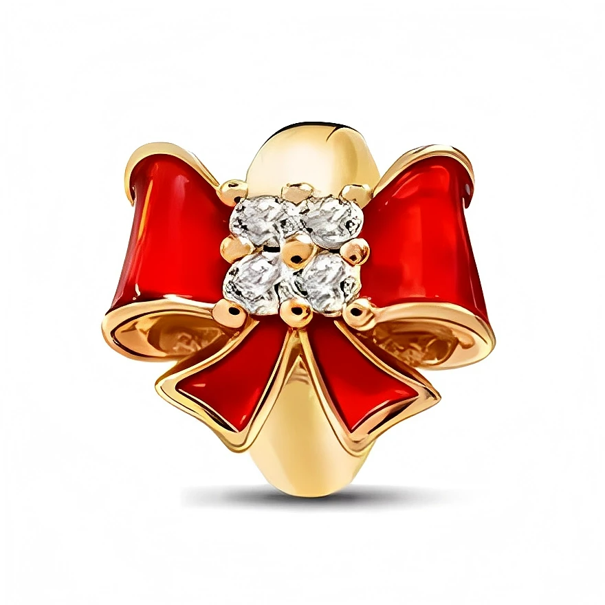 Ce charm en métal doré représente un grand nœud de cadeau rouge, aux rubans joliment incurvés mis en valeur par un émail brillant. Au centre, un bouquet de petites pierres claires façon cristal capte la lumière et donne une touche précieuse idéale pour les fêtes de fin d’année.

Caractéristiques :

- Matière : Alliage doré avec émail rouge et pierres synthétiques transparentes.
- Design : Large nœud de cadeau aux pans croisés, orné d’un cœur de cristaux.
- Coloris : Doré lumineux, rouge intense, éclats tran