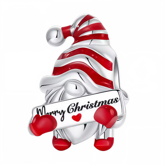 Invitez la féérie des fêtes sur votre bracelet avec ce charm Nain de Noël aussi espiègle qu’adorable ! Orné d’un bonnet rayé rouge et blanc façon sucre d’orge et tenant une pancarte « Merry Christmas » décorée d’un cœur, ce bijou capte toute la magie et la convivialité de la saison. Fabriqué en argent 925, il conjugue finitions soignées et couleurs éclatantes pour un rendu festif et chaleureux idéal à offrir ou à s’offrir pour célébrer Noël.