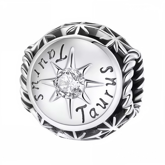Exprimez la force et la douceur du Taureau avec ce charm rond orné d’une pierre blanche éclatante au centre. Confectionné en argent 925, ce bijou allie élégance et symbolisme, parfait pour personnaliser votre bracelet ou offrir un cadeau unique à un passionné d’astrologie.