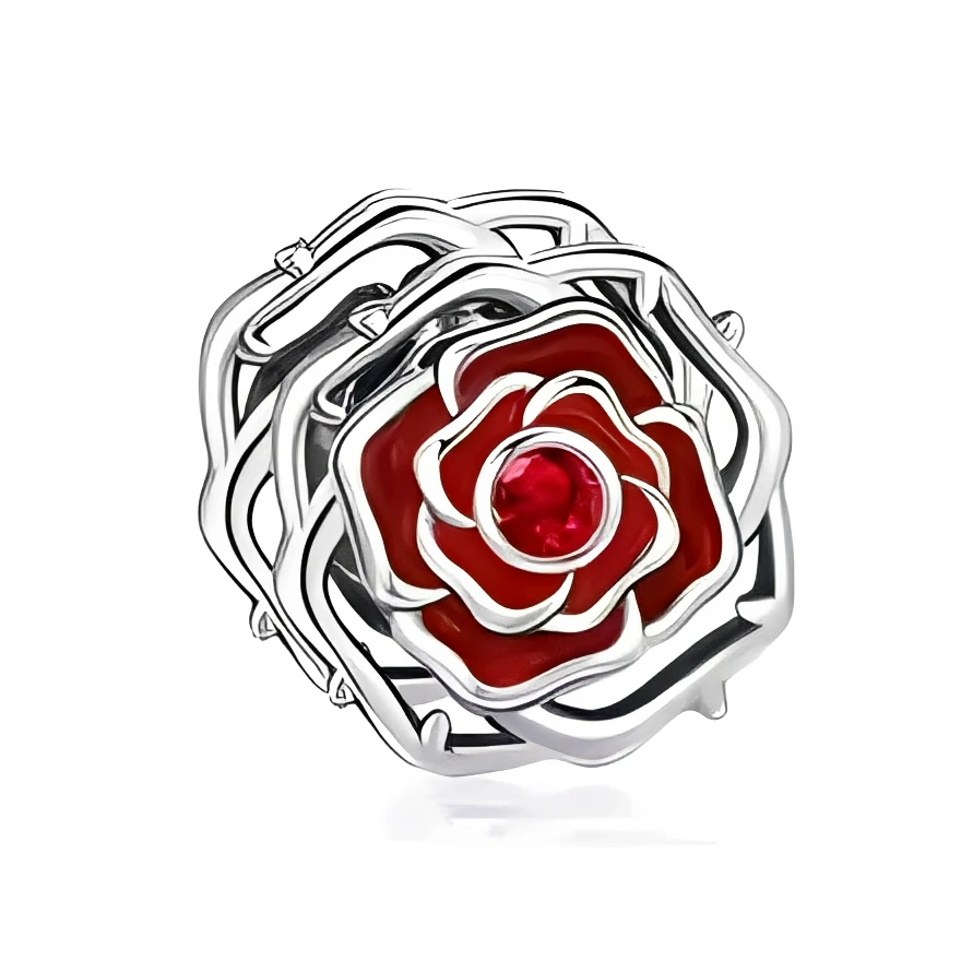 Ce charm en métal argenté forme une rose en relief, construite par plusieurs contours de pétales stylisés qui s’entrelacent pour donner un effet de fleur ouverte très graphique. Au centre, un cœur de rose rouge lisse est rehaussé d’une pierre ronde rouge facettée, qui apporte de la lumière et renforce le côté romantique de la pièce.

Caractéristiques :

-Matière : Métal argenté poli, émail rouge pour les pétales internes, cristal synthétique rouge au centre.
-Design : Rose en couches successives de contours