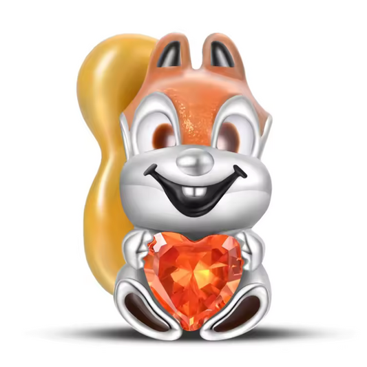 Ajoutez une touche de tendresse à votre collection avec ce Charm - Écureuil avec un Cœur, en argent sterling S925. Ce charm adorable représente un petit écureuil câlinant un cœur, symbolisant l'amour et l'affection. Parfait pour les amoureux de la nature et des animaux, ce charm apporte une dose de joie et de douceur à votre style.