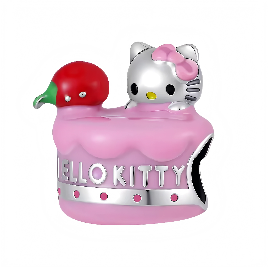 Ce charm pendentif gourmand et exotique présente&nbsp;Hello Kitty&nbsp;de l’univers Sanrio lovée dans un gâteau rose en émail lisse et crémeux, avec un kiwi réaliste en guise de topping fruité. Sa tête en argent poli émerge du glaçage ondulé, arborant son nœud rouge vif emblématique, ses moustaches fines, son petit nez jaune et ses yeux noirs expressifs pleins de malice. Le kiwi rouge vif avec peau verte texturée, pépins noirs et petite queue verte ajoute une touche tropicale et vitaminée, comme un dessert 
