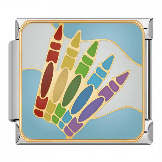 Ce charm italien en acier inoxydable argenté met en scène une rangée de crayons colorés – rouge, jaune, vert, bleu et violet – clin d’œil joyeux et symbolique au monde de l’école et de la créativité. Idéal pour représenter l’univers éducatif ou artistique, ce bijou apporte une touche vive et pleine de sens à votre bracelet. Son design ludique et coloré en fait un choix parfait pour les enseignants, les éducateurs ou les amoureux de la couleur. Facile à fixer, il s’adapte à tous nos bracelets italiens compos