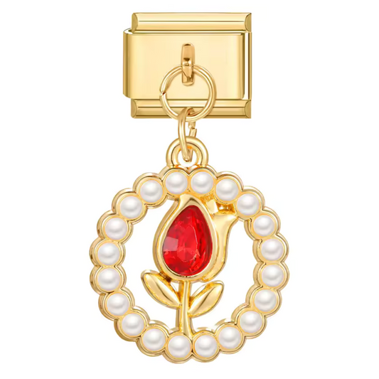 Ce charm italien pendentif en acier inoxydable doré met en scène une fleur élégante, sublimée par une pierre brillante rouge au centre qui apporte éclat et sophistication. Symbole de beauté et de passion, ce bijou raffiné apporte une touche chaleureuse et précieuse à votre bracelet. Le format pendentif ajoute du mouvement et valorise la brillance de la pierre à chaque geste. Facile à accrocher, il s’adapte à nos bracelets composés de 17 maillons extensibles et réglables, convenant à toutes les tailles de po
