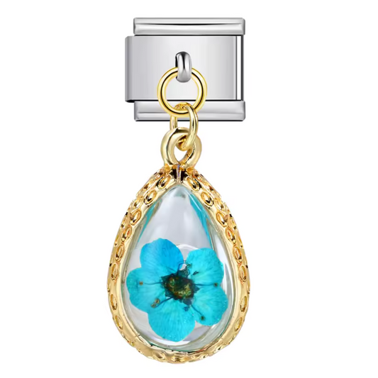 Charm pendentif italien en argent 925 en forme de goutte, décoré de délicates fleurs bleues, pour un style raffiné et élégant sur vos bracelets ou colliers.

Caractéristiques
– Métal : argent 925
– Design : goutte avec fleurs bleues
– Type : pendentif
– Finition soignée et élégante