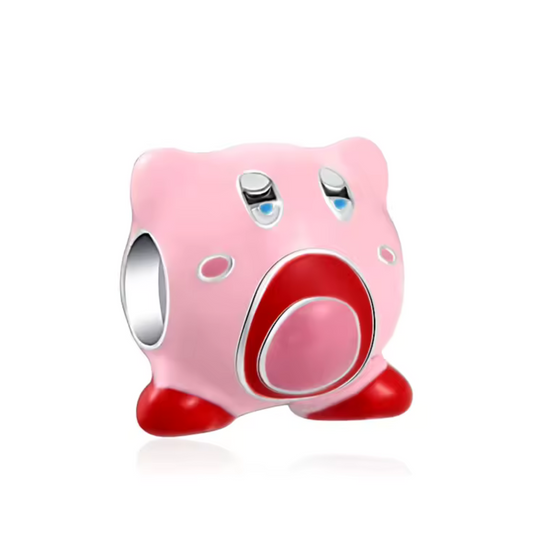 Ajoutez une touche de douceur et de charme à votre collection avec ce charm inspiré de Kirby, le héros rond et rose des jeux vidéo classiques. Conçu en argent sterling S925, ce charm capture le caractère adorable et emblématique de Kirby, avec ses grands yeux expressifs et son sourire joyeux.