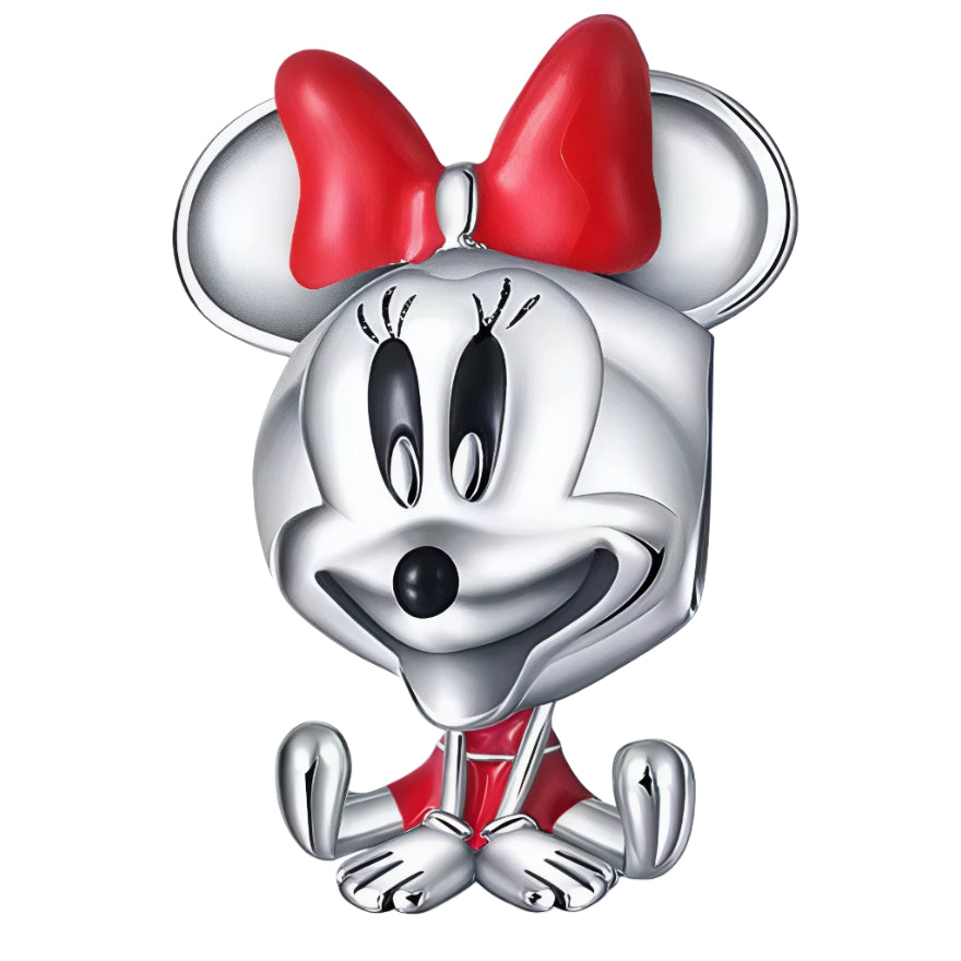 Ajoutez une touche de magie Disney à votre collection avec ce charm &nbsp;Minnie Mouse Robe rouge&nbsp;! Fabriqué en argent S925, ce charm adorable représente la célèbre Minnie Mouse, avec ses oreilles emblématiques et son nœud rouge à pois. Parfait pour les fans de Disney et ceux qui aiment afficher leur style ludique, ce charm est également compatible avec les bracelets Pandora, permettant une personnalisation infinie de votre bijou.