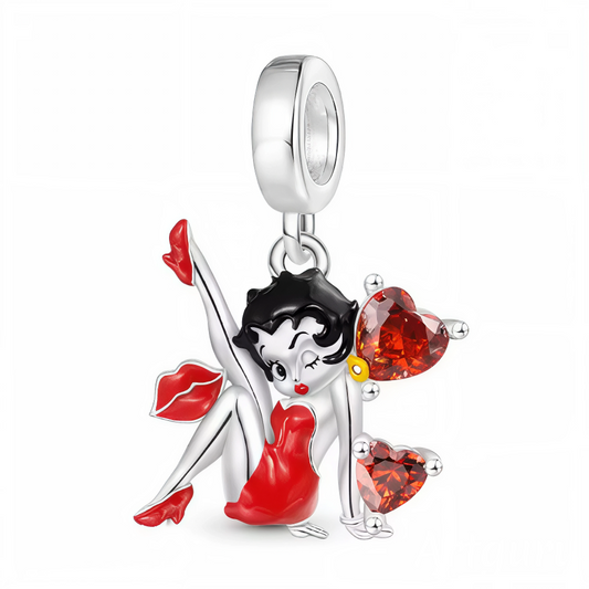 Affichez votre style glamour et rétro avec ce magnifique charm pendentif Betty Boop. Représentée dans une pose iconique, Betty est entourée de petits cœurs brillants qui apportent une touche d’éclat. Ce bijou est un clin d’œil à la féminité, l’élégance et la nostalgie. Parfait à ajouter sur un bracelet charms ou à porter en pendentif.