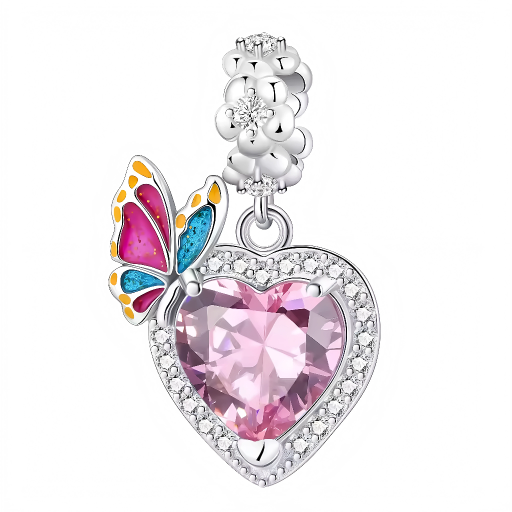 Ce charm pendentif en argent 925 révèle un cœur rose quartz facetté étincelant, accompagné d'un papillon aux ailes émaillées arc-en-ciel magenta-bleu-jaune et surmonté d'un cluster de perles blanches bubble pour un charme vibrant et libre. La bélière pavée de strass diffuse une lumière féerique.

Caractéristiques :

Matière : Argent 925 (S925)
Design : Pierre cœur rose vif avec papillon wings colorées et perles blanches, suspendu à anneau cristal.
Style : Joyeux et transformateur, idéal pour célébrer la lib