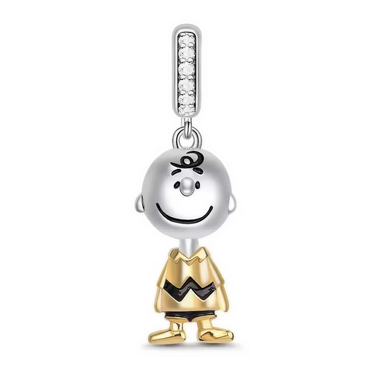 Ajoutez une touche précieuse à votre collection avec ce charm pendentif représentant Charlie Brown, vêtu de son célèbre t-shirt orné d’un motif en finition dorée. Ce bijou en argent 925 allie élégance et nostalgie, capturant l’innocence et la simplicité du personnage culte de Peanuts.