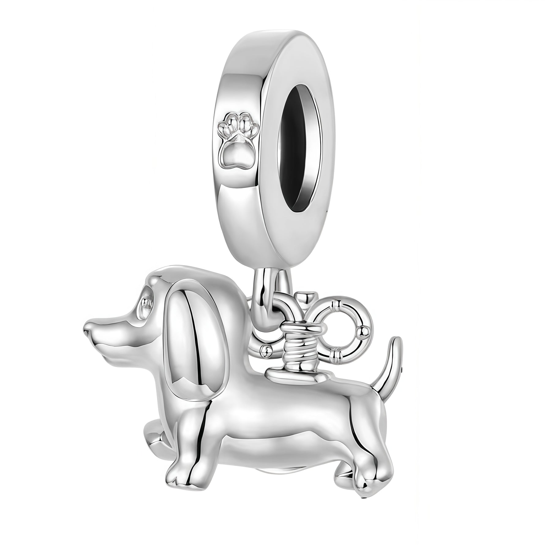 Apporte une touche tendre et originale à ton bracelet avec ce charm pendentif chien argenté. Son design en argent 925 met en valeur un petit chien plein de charme, symbole de fidélité, d’affection et de joie. Un bijou élégant et attachant, parfait pour les amoureux des animaux.

Caractéristiques :

- Matière : Argent 925.
- Design : Chien argenté en pendentif avec finitions soignées.
- Dimensions : Taille délicate et confortable à porter.
- Style : Bijou animalier, raffiné et original.
- Symbolique : Fidéli