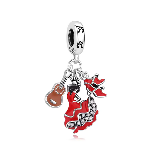 Célébrez la passion et l’élégance de la culture espagnole avec ce charm représentant une danseuse espagnole accompagnée d'une guitare et de ses chaussures de danse. Fabriqué en argent 925, ce bijou incarne la grâce et l’énergie du flamenco, mêlant musique et danse dans une expression vibrante de joie et de tradition. Idéal pour les amateurs d’art et de culture, ce charm ajoutera une touche de dynamisme et de chaleur à votre collection.